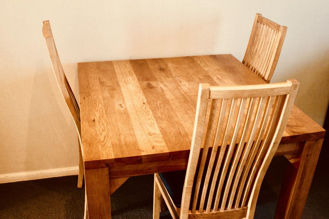 The Nautilus Hotel Napier Buitenkant foto A dining table and chairs